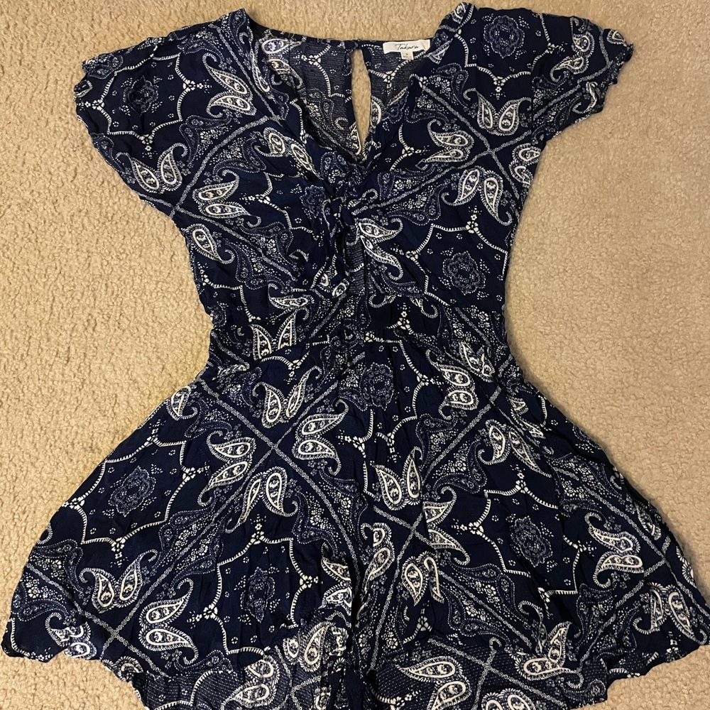 Loose fitting royal blue romper with white detailing